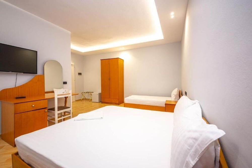 Deluxe Triple Room, Balcony, Partial Sea View