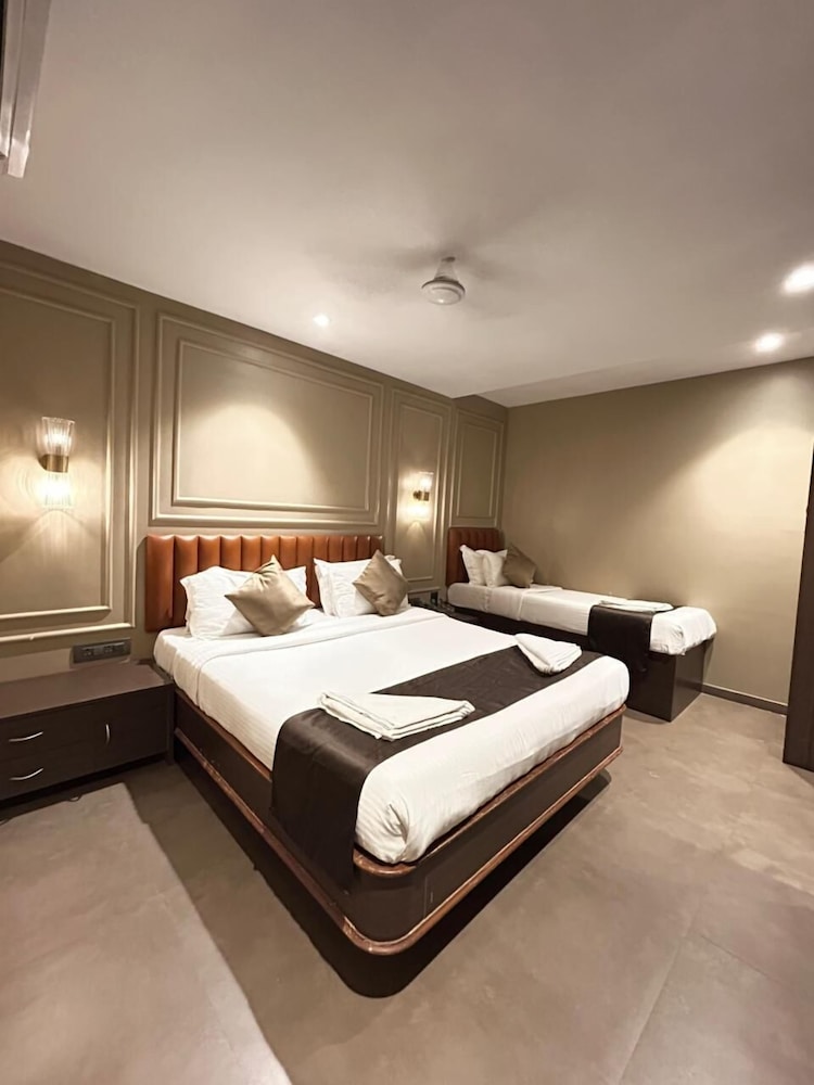 Super Deluxe Triple Room - Photo 1