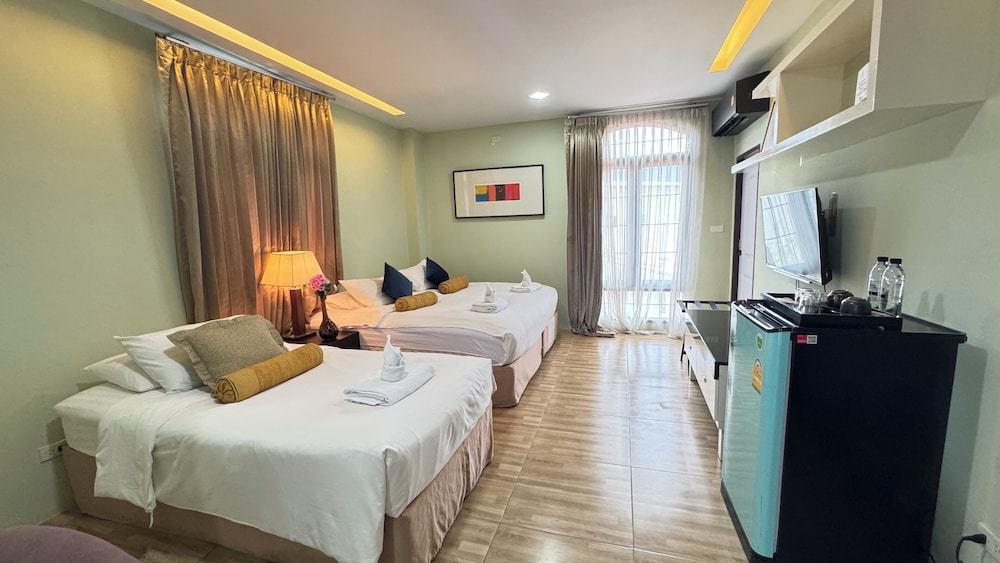 Deluxe Triple Room - Photo 1
