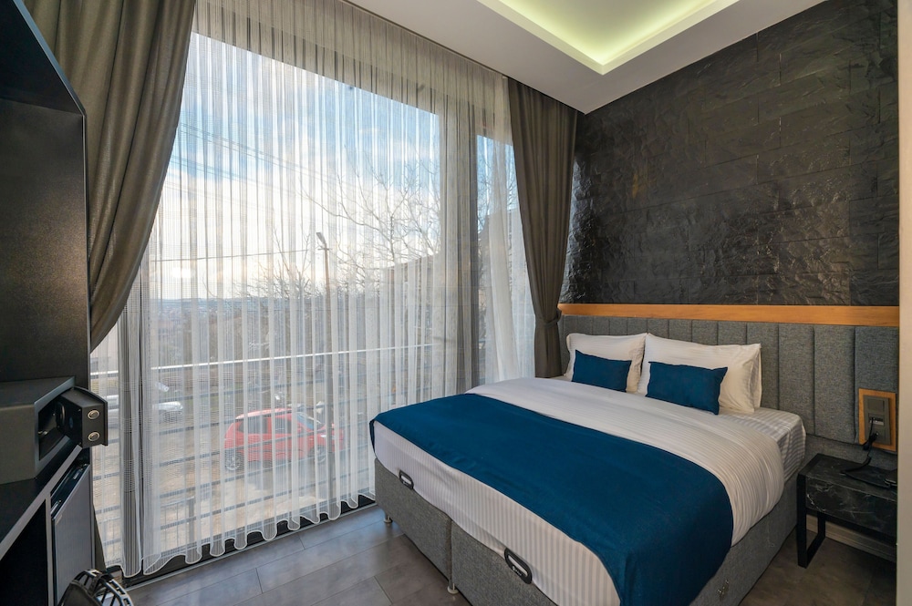 Deluxe Triple Room - Photo 16