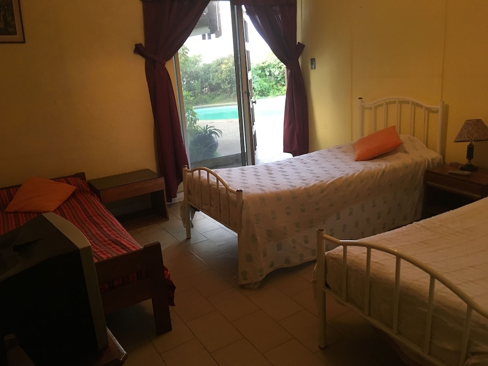 Triple Room, Multiple Beds, Shared Bathroom photo 1