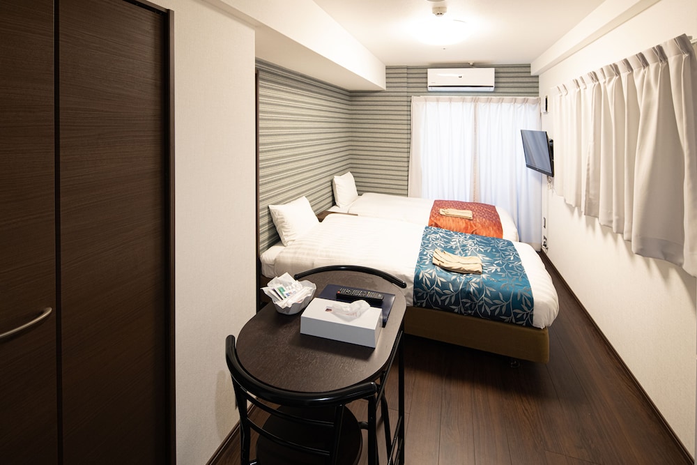 Standard Twin Room - Photo 9