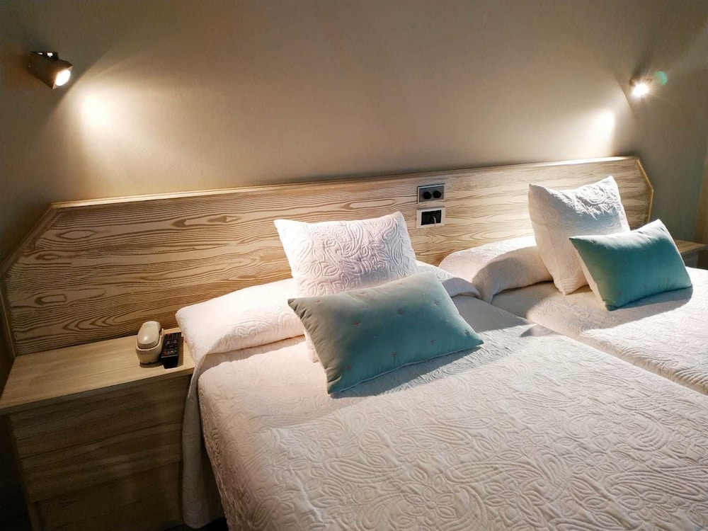Habitación Doble Estándar o con Dos Camas Individuales.