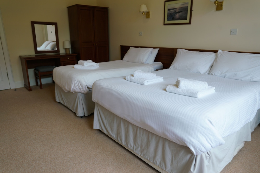 Deluxe Triple Room - Photo 10