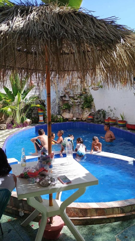 Economy Quadruple Room, Pool View photo 1