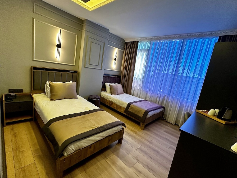 Family Quadruple Room - Photo 11