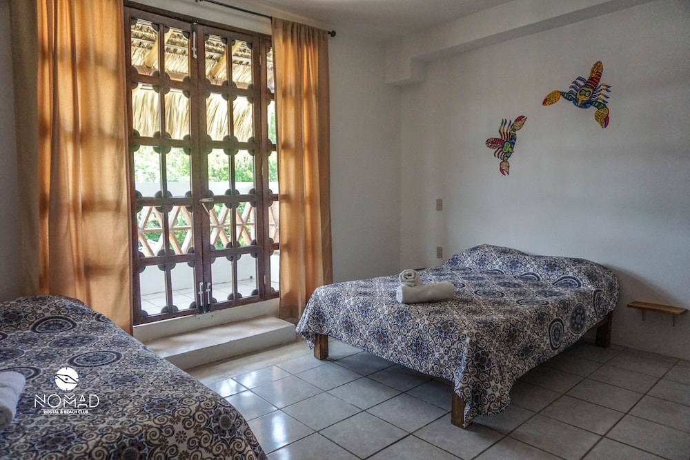 Superior Quadruple Room, 2 Queen Beds, Lagoon View, Beachside