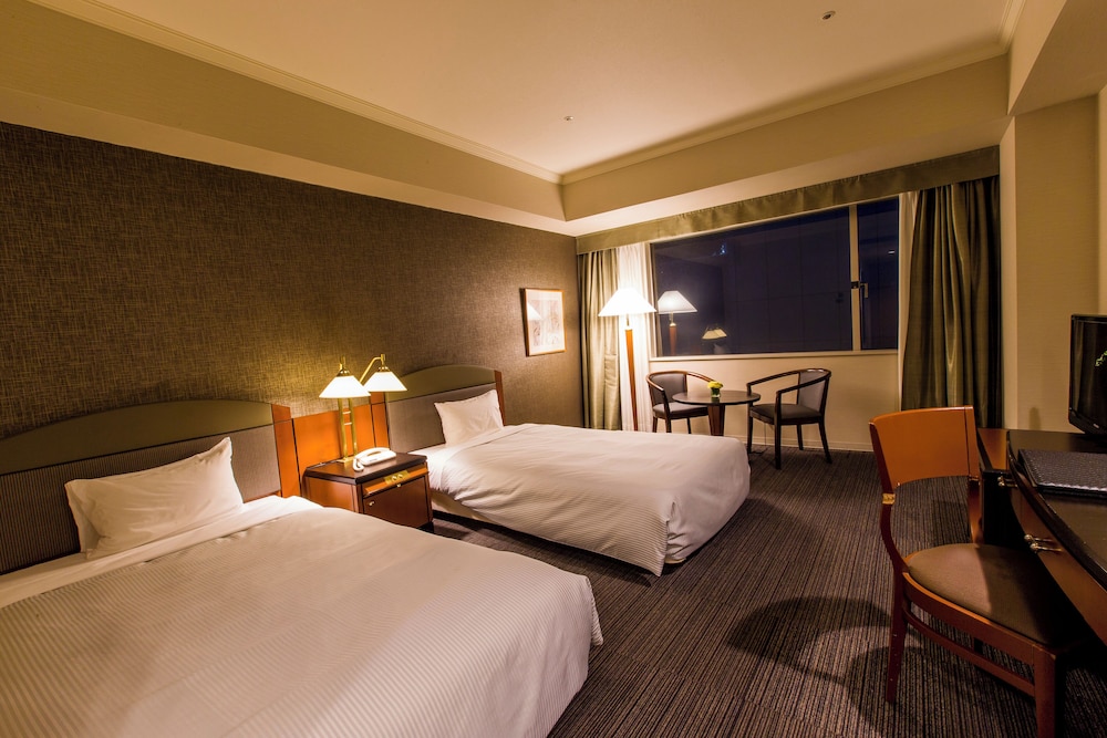 Twin Room, Non Smoking (Assign at Check-in) Non Smoking - Photo 1