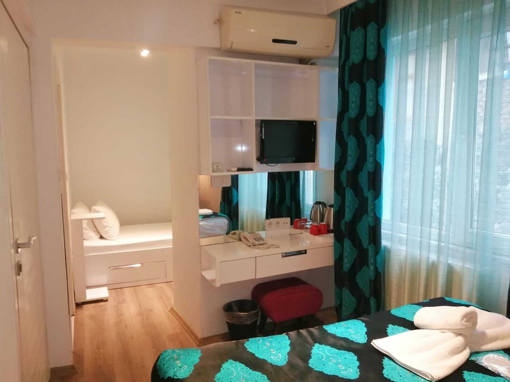 Family Triple Room, 2 Bedrooms, Non Smoking, City View photo 1