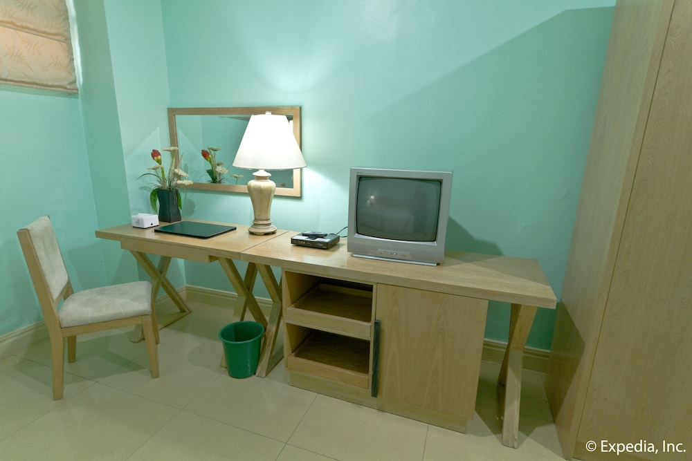 desk with an old television and chair in it?
