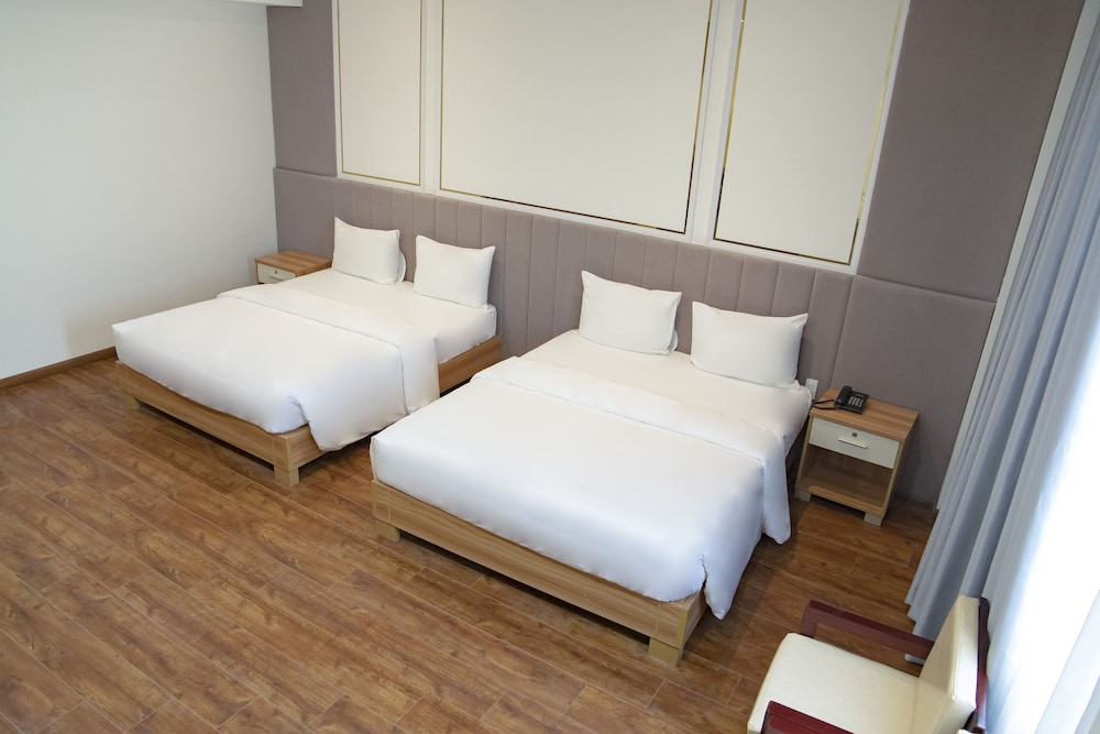 Deluxe Quadruple Room, 2 Queen Beds