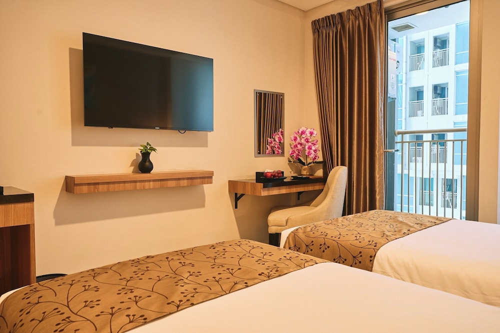 Deluxe Room - Photo 2