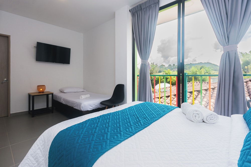 Deluxe Triple Room, Garden View photo 1