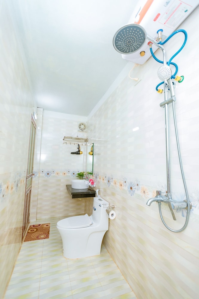 Deluxe Triple Room, Garden View photo 2