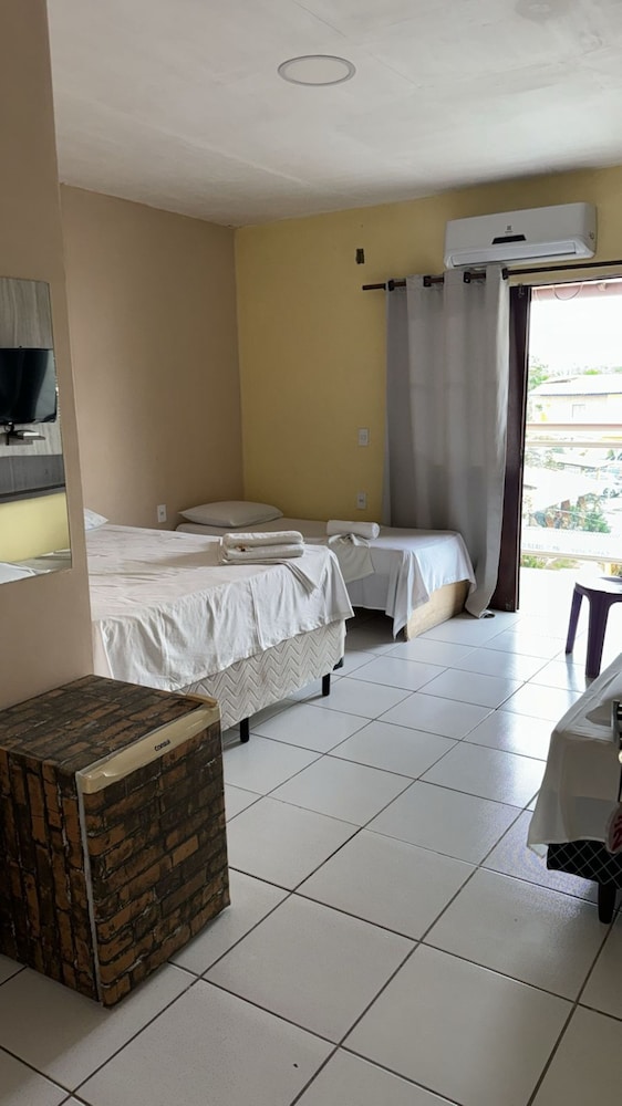 Economy Triple Room, City View photo 1
