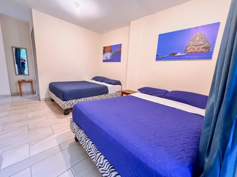 Exclusive Quadruple Room, 2 Double Beds, Balcony, Ocean View photo 1