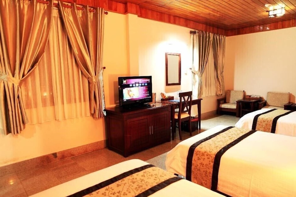 Deluxe Triple Room, Garden View photo 2