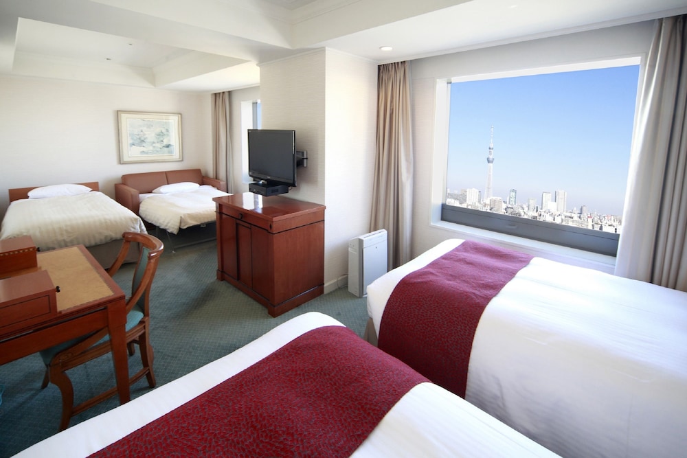 [Non-Smoking] Deluxe Family Twin Room (with 1 Extra bed + 1 Sofa bed)