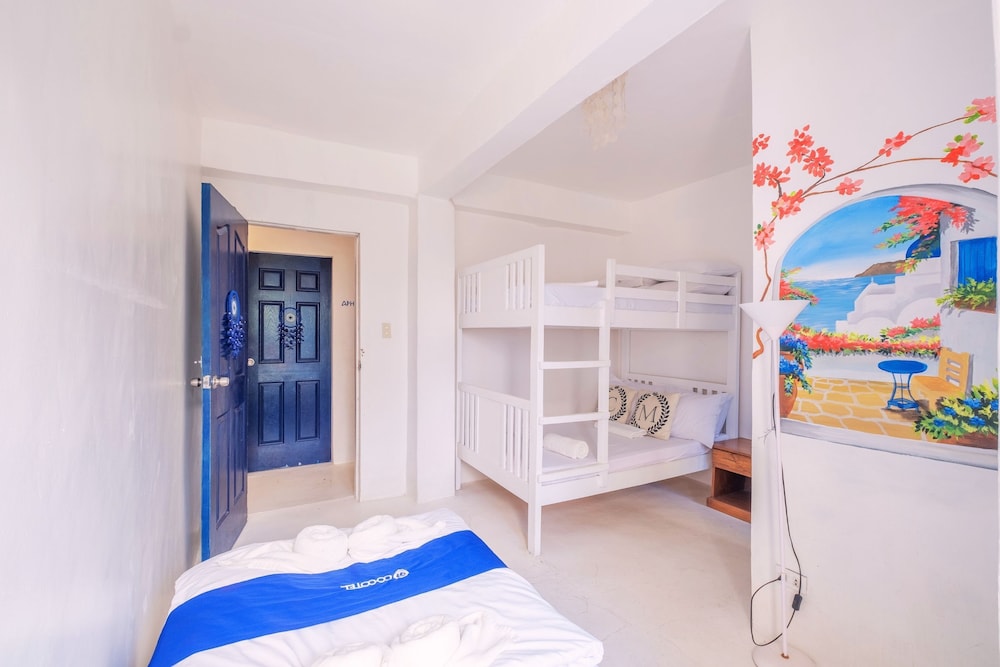 Deluxe Quadruple Room - Photo 2