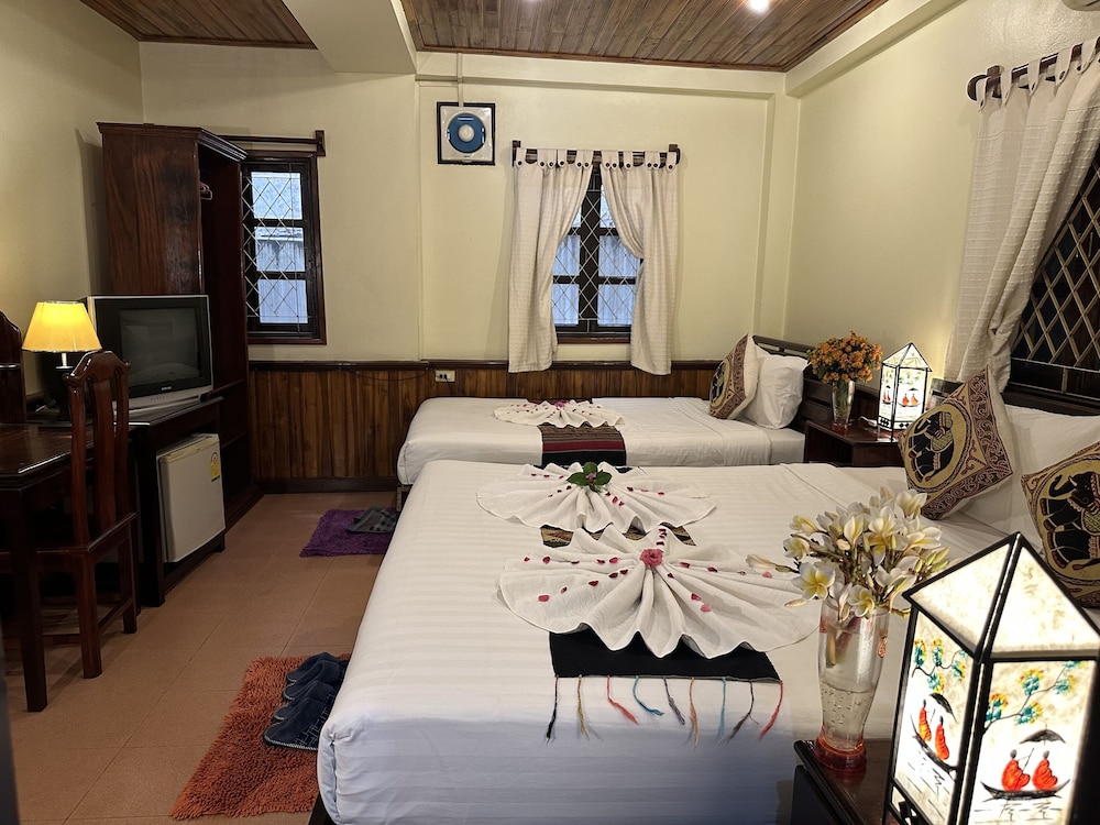 Deluxe Triple Room - Photo 14