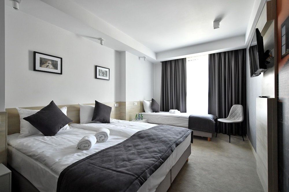 Standard Triple Room - Photo 1
