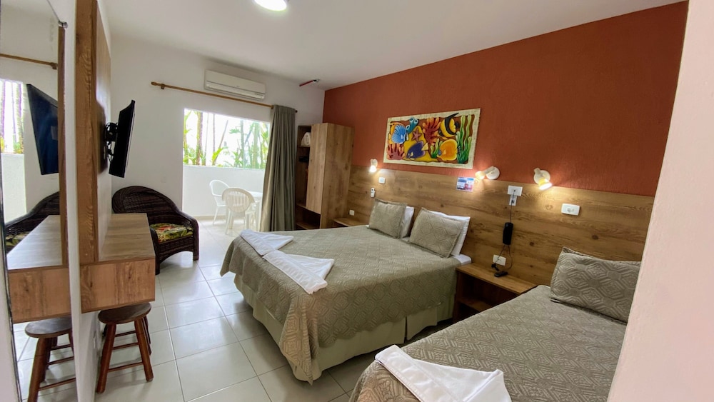 Quarto Triplo Terreo Vista Parcial Mar photo 1