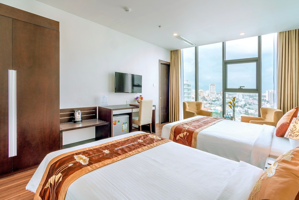 Deluxe Triple Room, Beach View, Beachfront photo 2