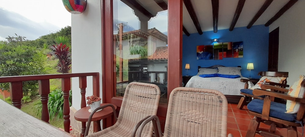 Habitación Triple Estándar, Balcón y Vista al Jardín photo 1