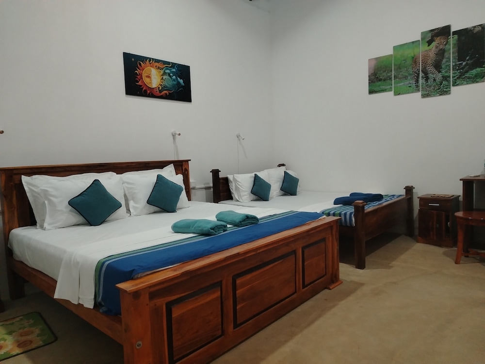 Deluxe Quadruple Room, Garden View photo 1