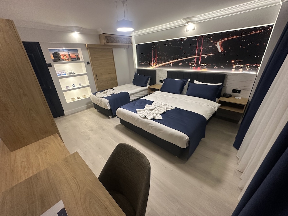 STANDARD TRIPLE ROOM - Photo 1