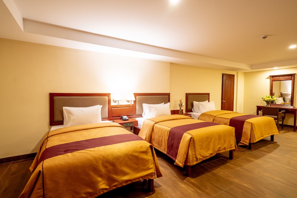 Deluxe Triple Room, Bathtub, Balcony - Photo 11
