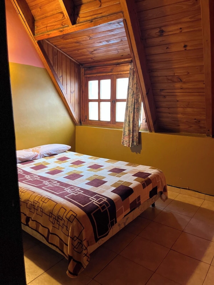 Economy Quadruple Room, Mountainside photo 1