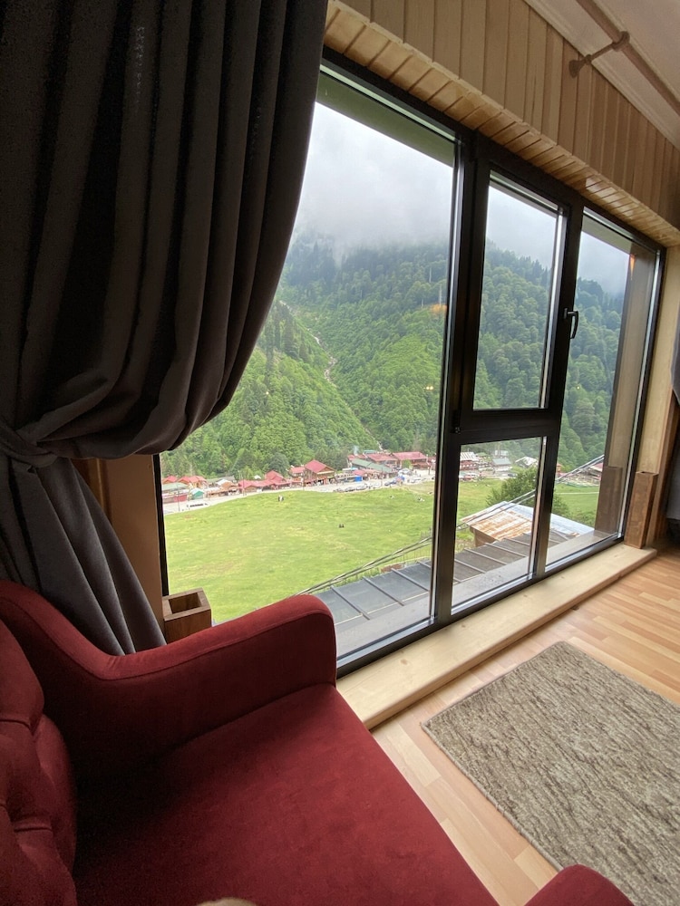 Deluxe, Fireplace, Waterfall View