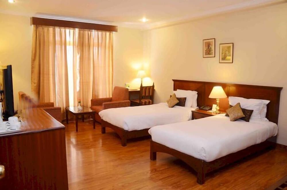 Deluxe Room - Photo 10