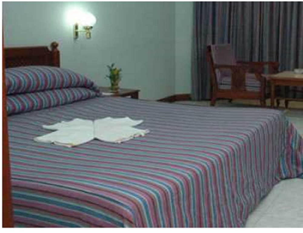 Basic Quadruple Room, 2 Double Beds, Non Smoking photo 1