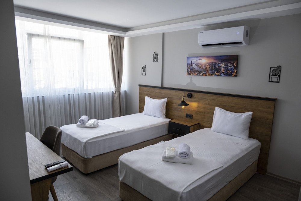 Standard Twin Room - Photo 15
