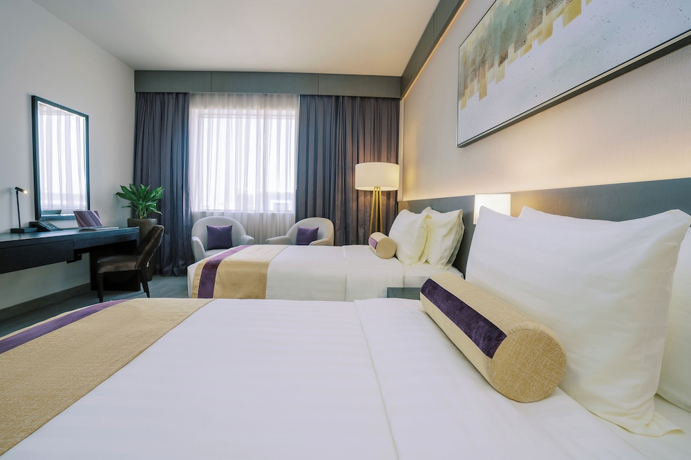Deluxe Twin Room ,15% off on F&B, shuttle to Deira City Center, Al Ghurair Mall & La Mer Beach photo 2