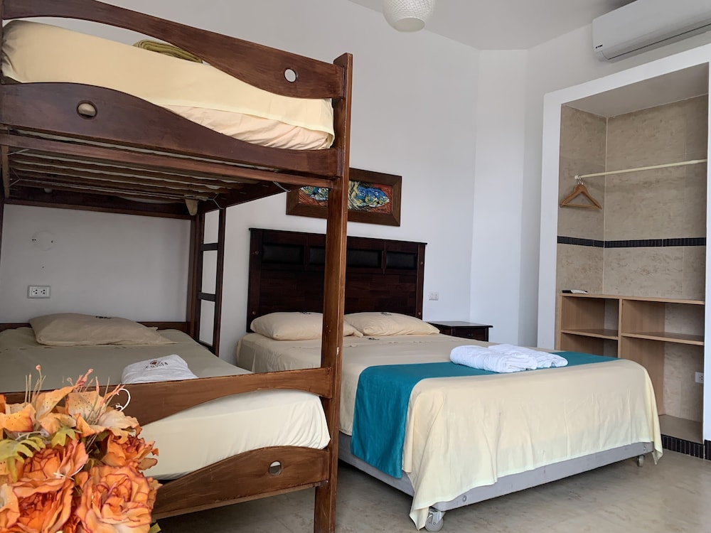 Family Quadruple Room, Multiple Beds, Balcony, Pool View photo 1