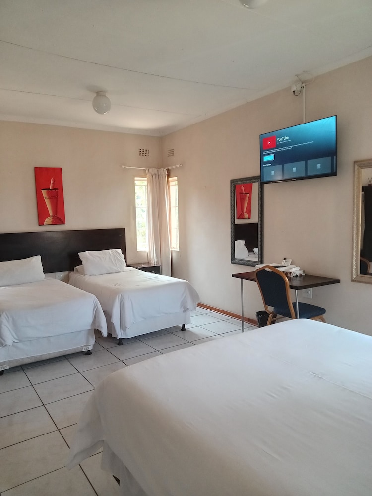 Basic Quadruple Room, Garden View photo 1