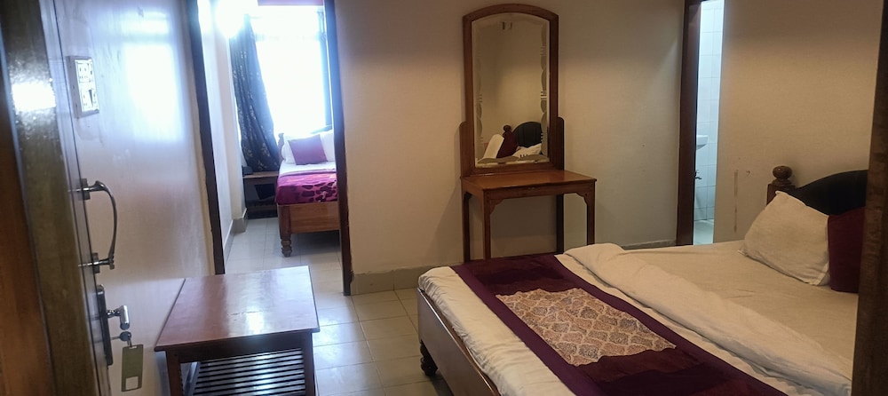 Deluxe Quadruple Room, City View