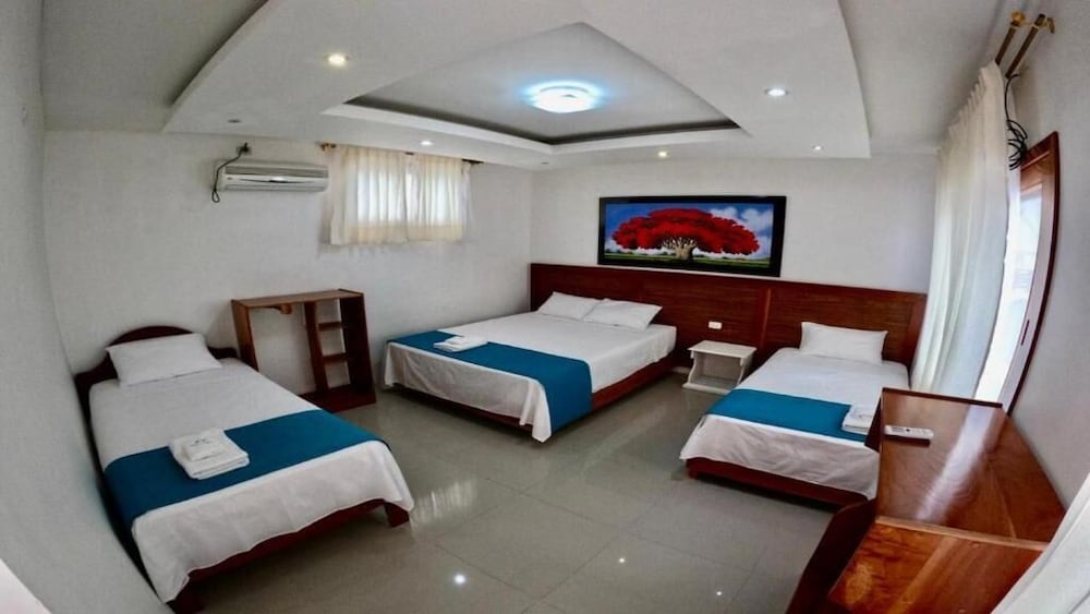 Deluxe Triple Room, Multiple Beds, Patio, Pool View photo 1