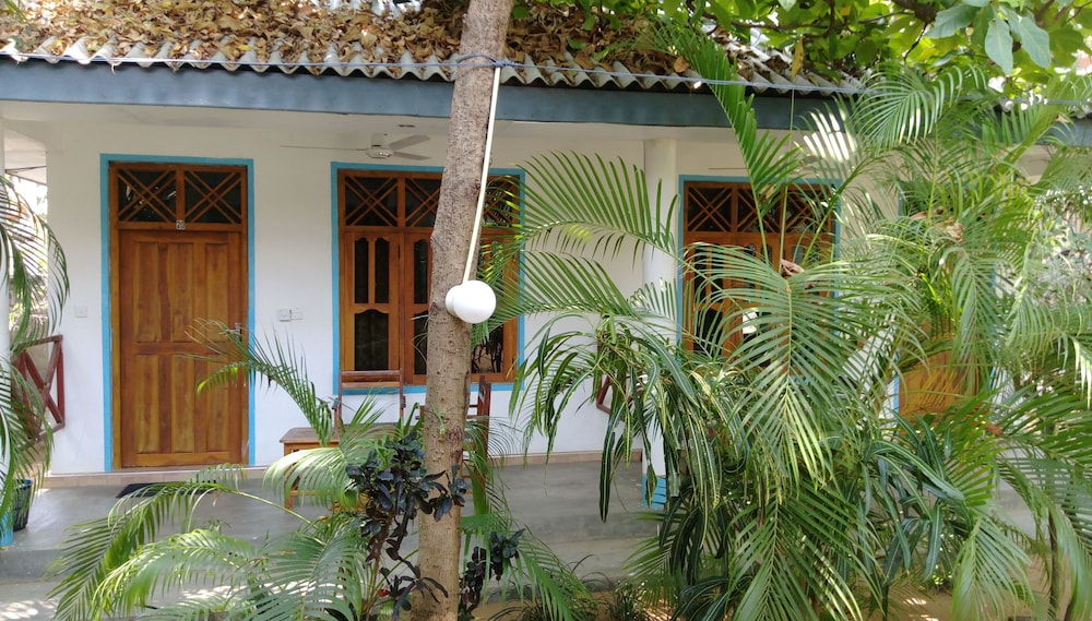 Deluxe Triple Room, Garden View photo 2