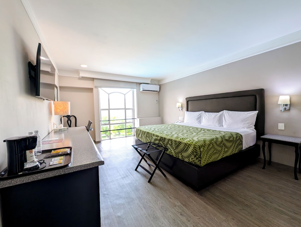 Deluxe Room - Photo 1