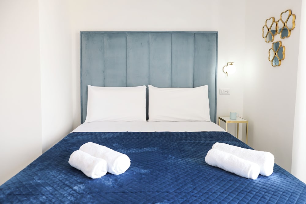 Room with blue bed