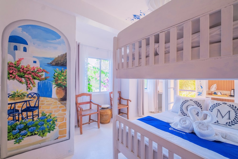 Premier Quadruple Room - Photo 11