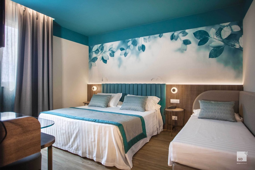 Deluxe Triple Room - Photo 8