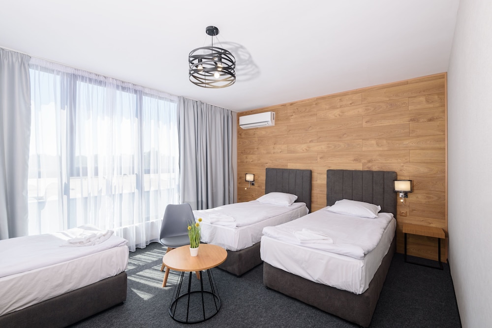 Deluxe Triple Room - Photo 1