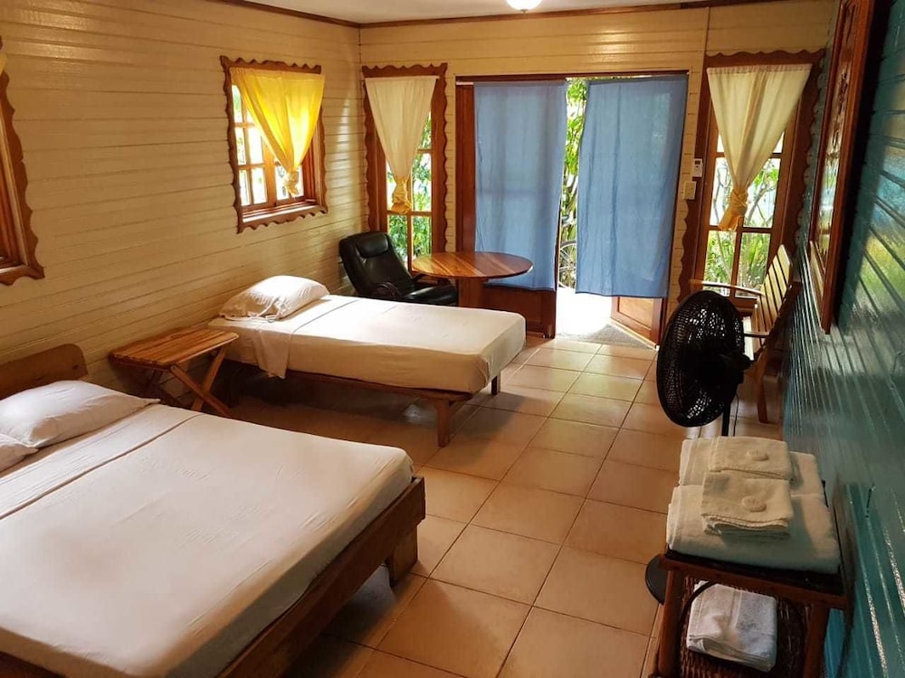 Basic Triple Room, Multiple Beds, Garden Area photo 1
