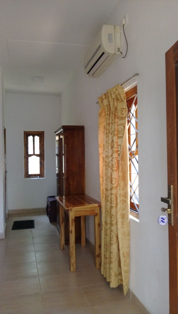 Deluxe Triple Room, Garden View photo 2