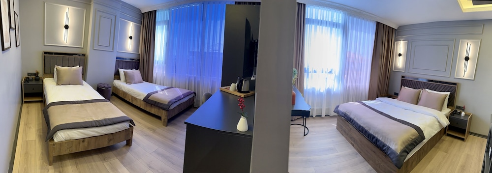 Family Quadruple Room - Photo 1
